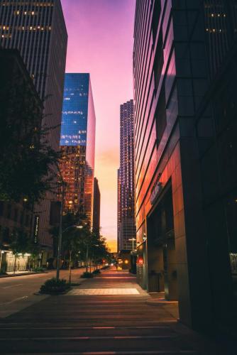 houston-empty-street-between-high-rise-buildings-during-nighttime